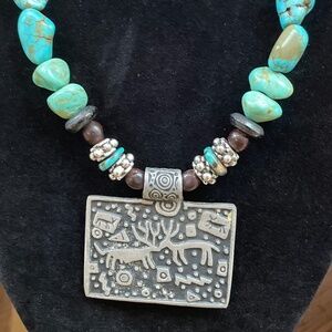 Striking turquoise and pewter beaded with Southwest pewter petroglyph pendant